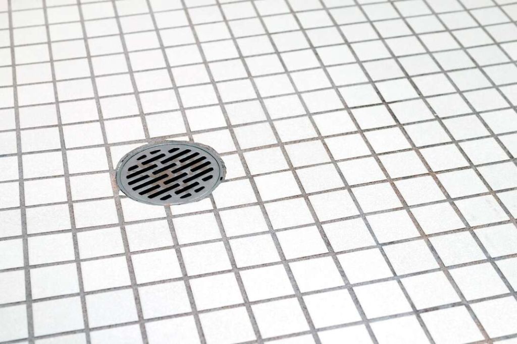 how to remove shower drain