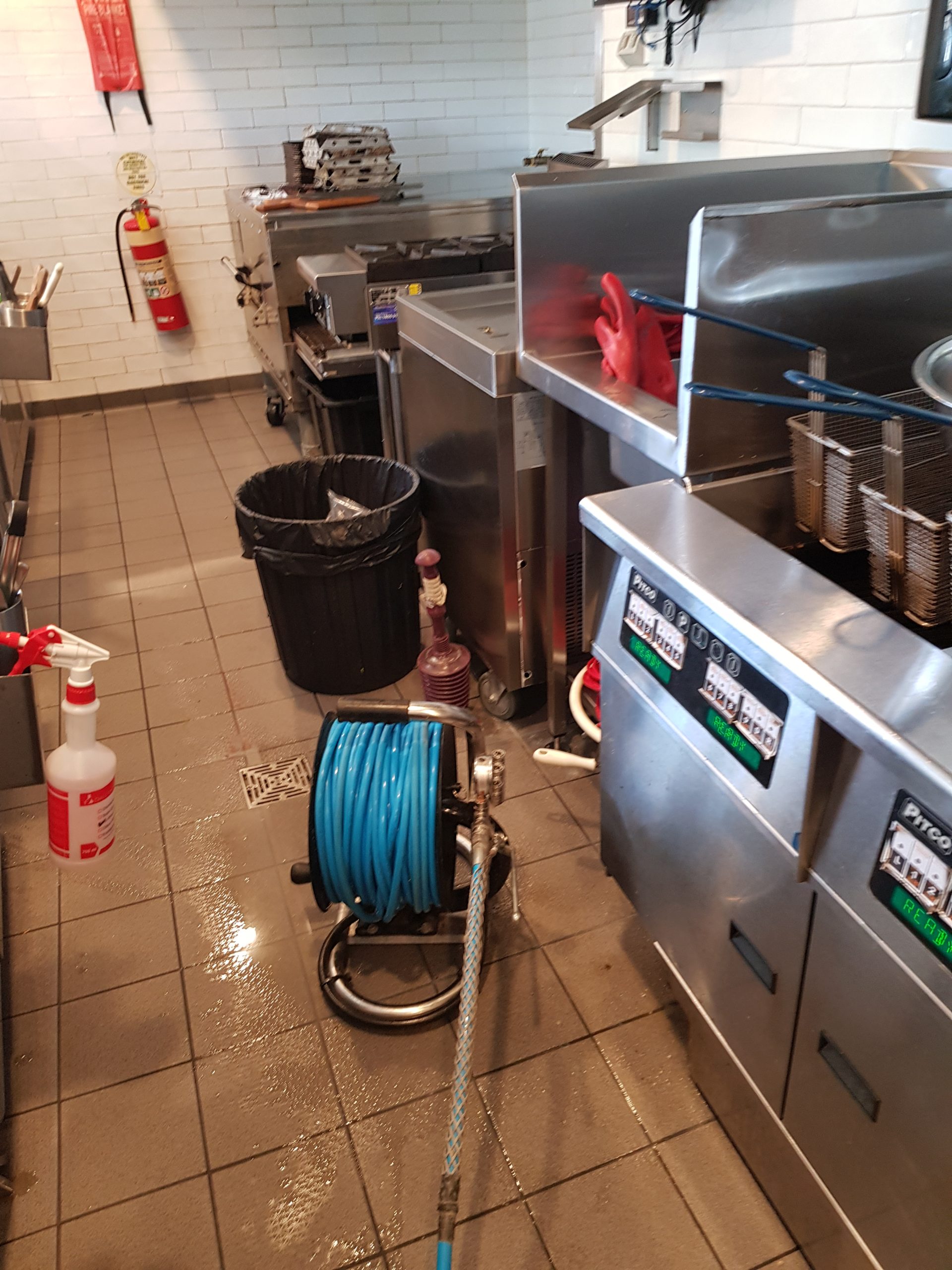 Brisbane City commercial kitchen: floor-waste blockage from day-to-day sweep-ins