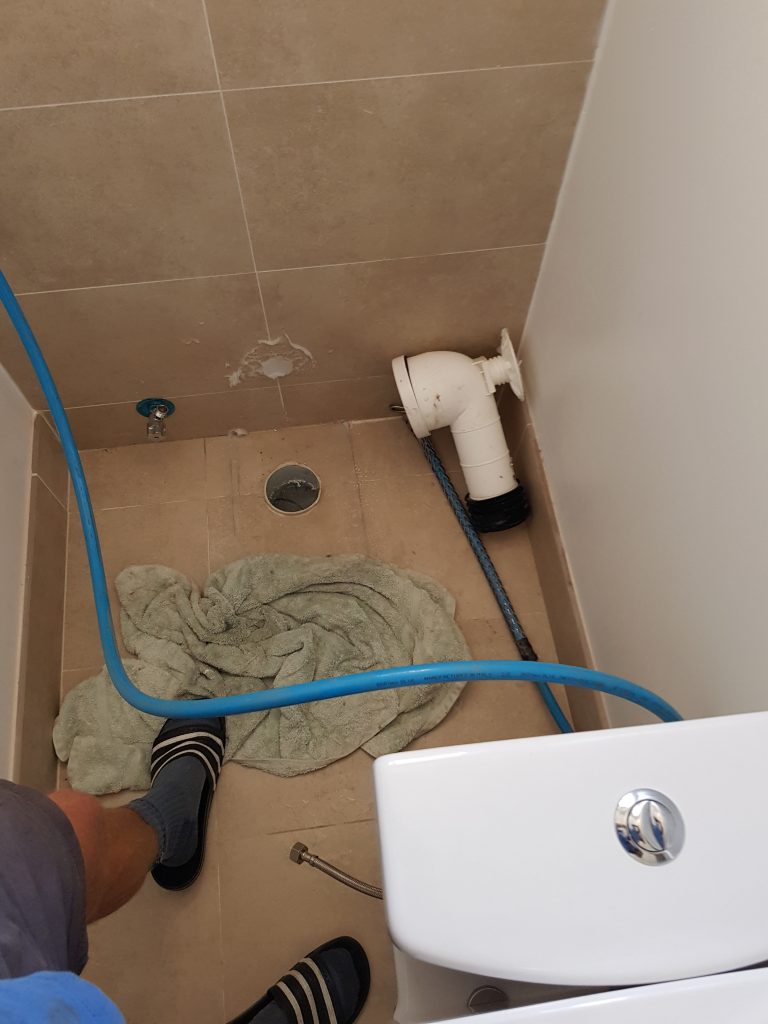 Hydrojet clearing fat deposits from a commercial kitchen HDPE sewer line in Brisbane after the grease trap flooded.